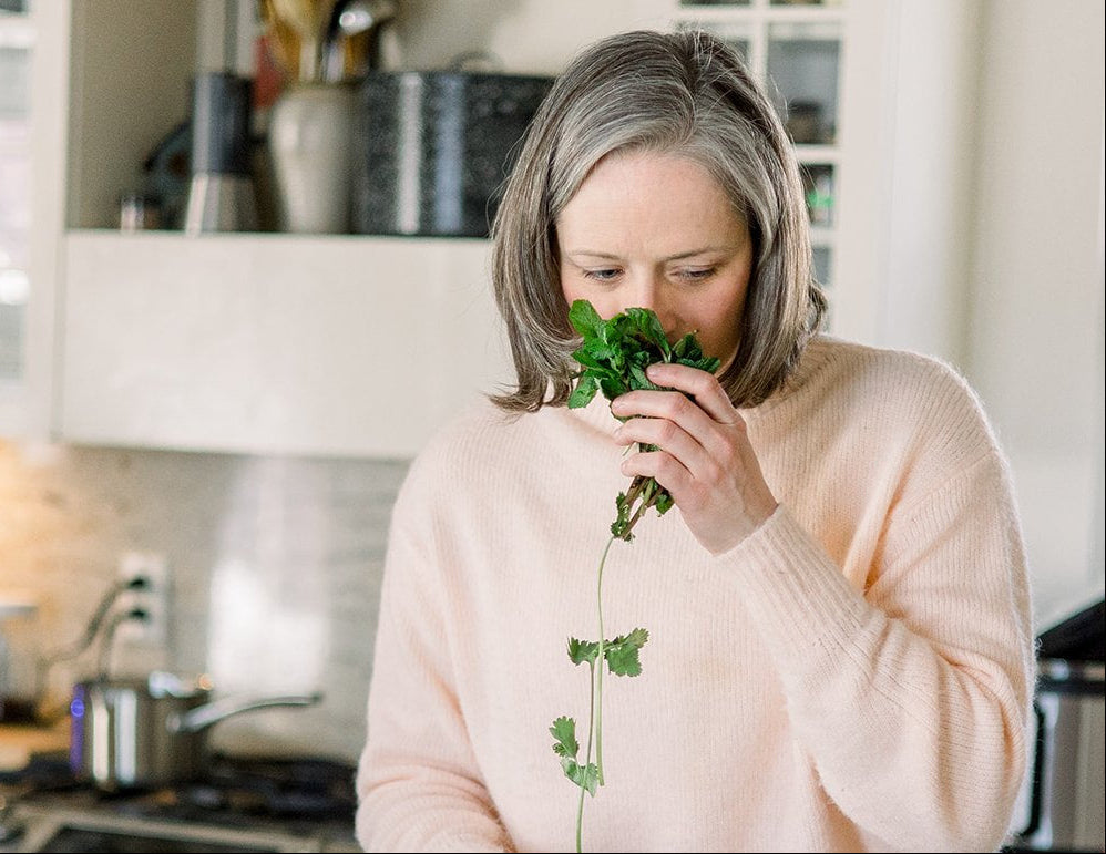 emilie-reid-smelling-herbs